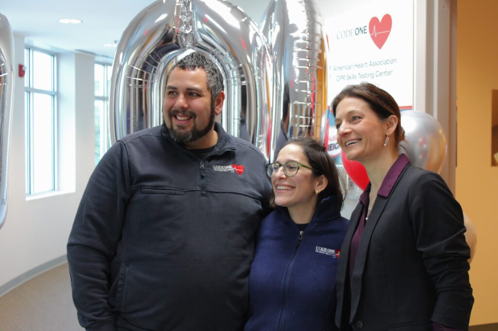 Code one executive team celebrates 100th location opening